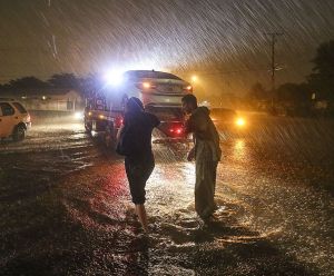 Photo by Damon Higgins of the Palm Beach Post http://www.palmbeachpost.com/photo/news/flooding/p4sK6/